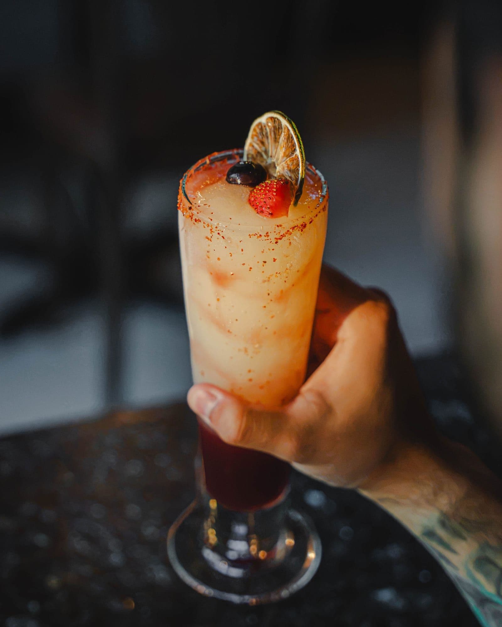 A mango margarita with a chile-salt rim